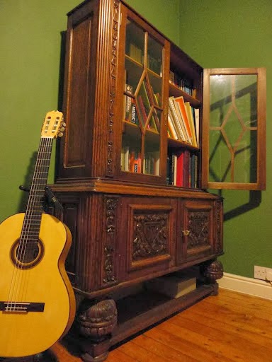 Guitar and music books in David's teaching room
